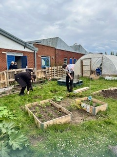 Students have been very busy on the allotment creating new beds, tidying the existing beds and sowing seeds. We now really need some topsoil or compost to help our plants flourish, so if you are able to donate any, even part bags, the students would be very grateful. Thank you!