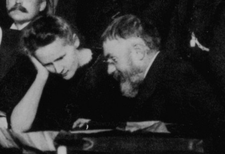 Maria Skłodowska-Curie and Henri Poincaré discussing at the 1911 Solvay Conference held in Brussels. The subject of the conference was 'Radiation and the Quanta.'