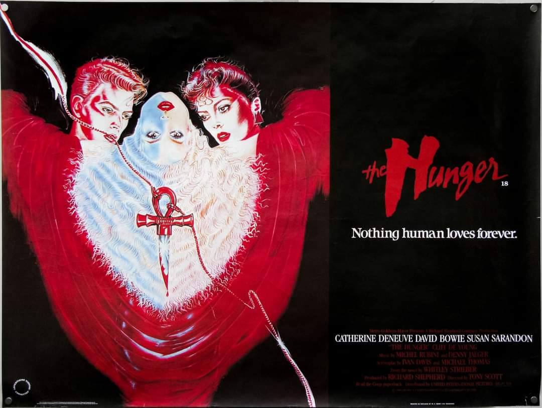 On this day in 1983, 'The Hunger' was released starring Catherine Deneuve, David Bowie and Susan Sarandon. Laced with vampiric love and death, and a stunning opening sequence in a goth club with a caged Bauhaus, it's a cult classic!