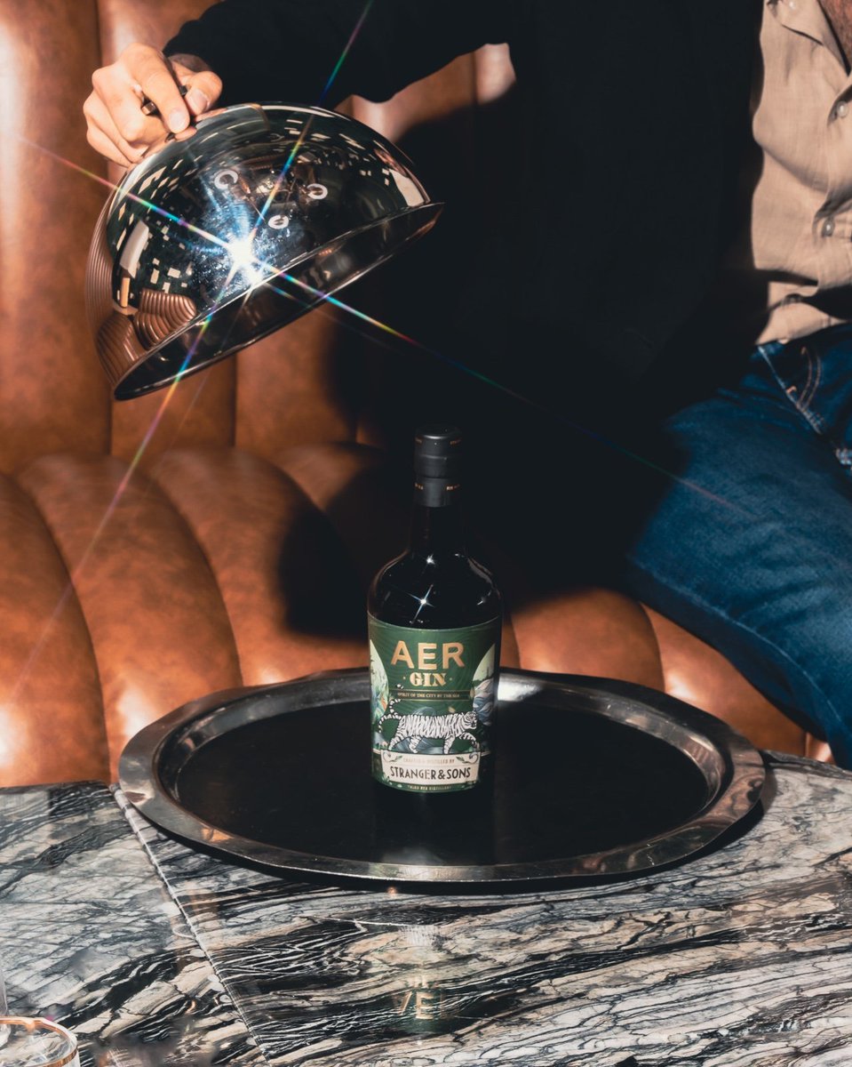strangerandsons's tweet photo. Inspired by the luxe, nautical interiors and views of @AERMumbai, we encapsulated the Spirit Of The City By The Sea in a bottle. Make your way to the rooftop bar at @FSMumbai to sip on AER Gin, exclusively available for consumption at the bar. 
#Mumbai #India #Gin #Collab https://t.co/Fk4oV6MFzZ
