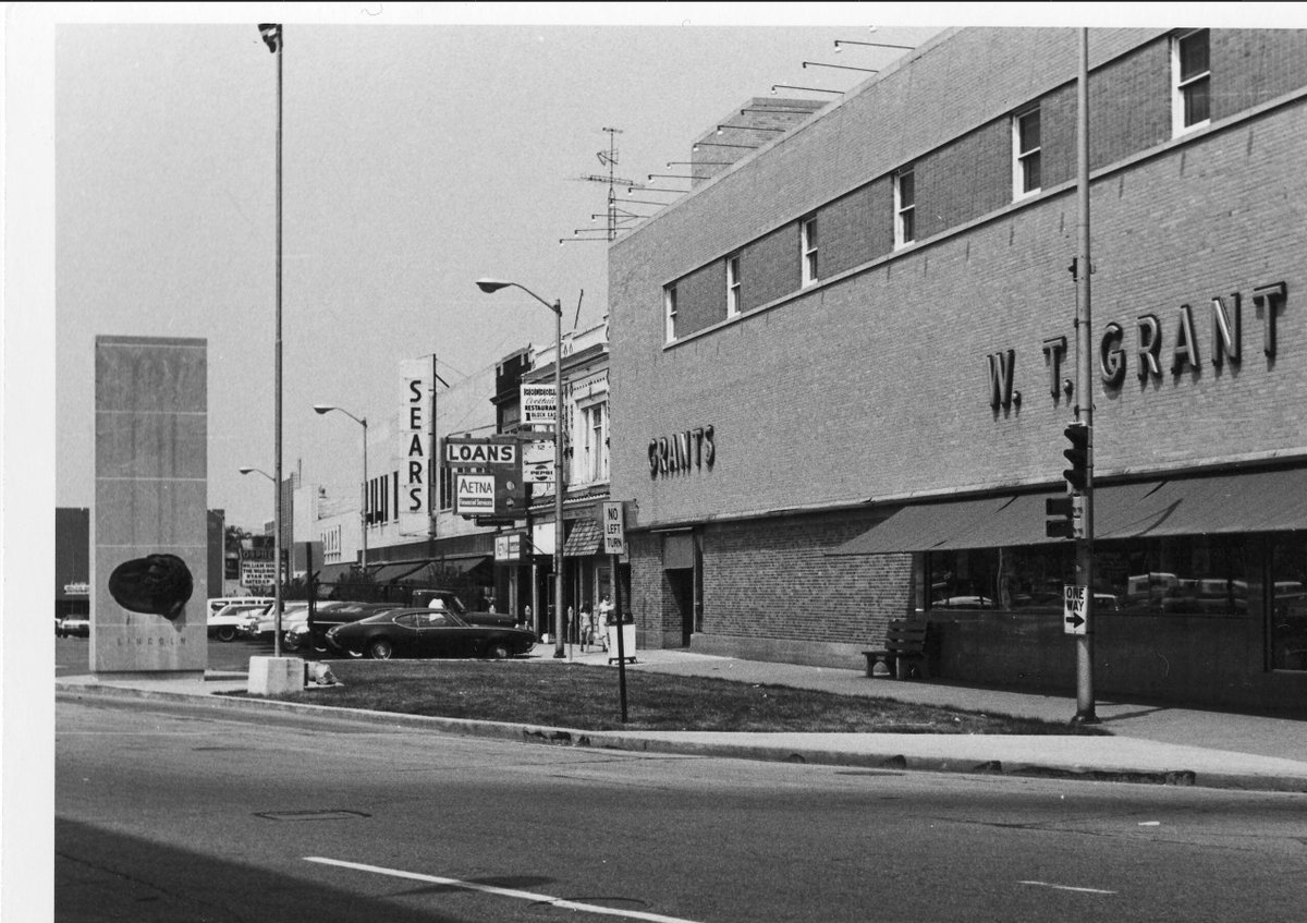 @mr1llinois I tried to do more research. Information about the megalith is super tough to find. I did find two photos of it from its original location downtown. This is looking northeast from the corner of Neil/Church/Main Streets. You can see the Orpheum Theatre in the distance.