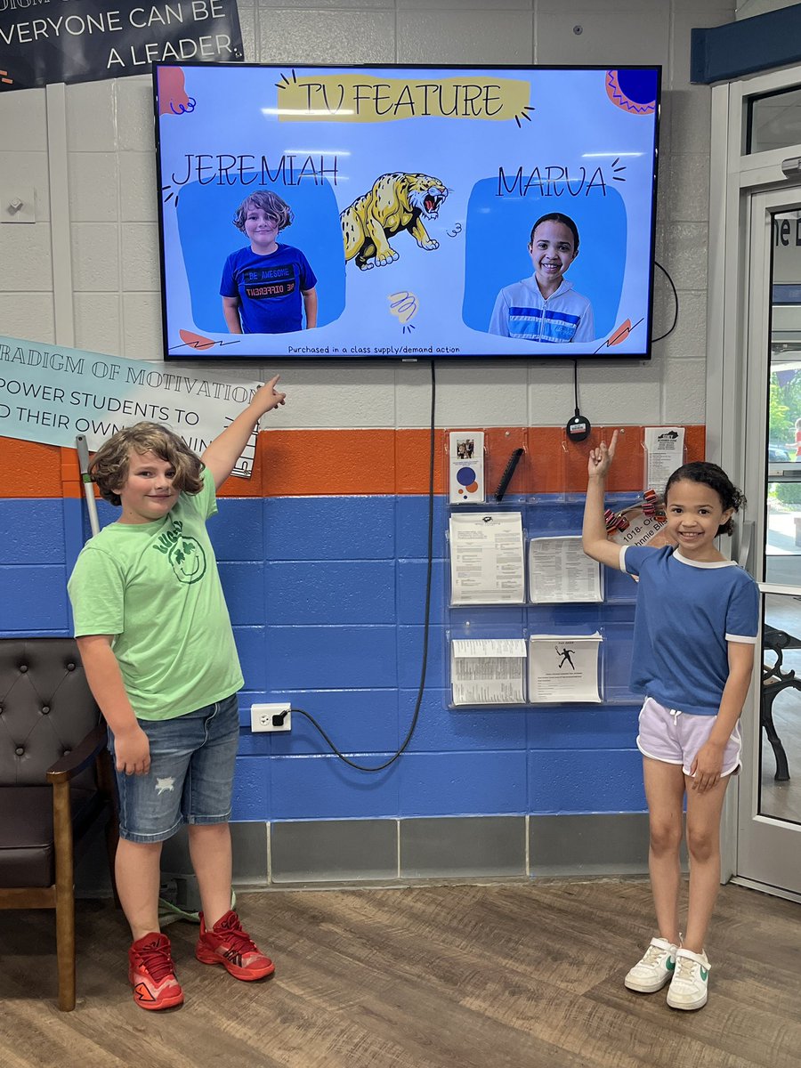 Our supply & demand auction has ended and students are starting to receive their prizes. These 2 students bought a certificate to be featured on the TV in the lobby. @NatcherElem @Mrs_HallsClass