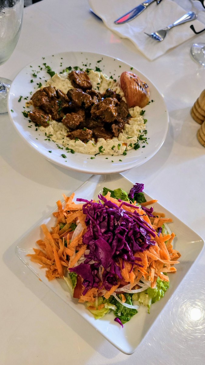 A fantastic Mediterranean meal out. Almost perfectly on plan too! Tomatoes & other veggies hidden under the cabbage & lettuce in the salad. Under the tender chunks of lamb is a puree of eggplant, Greek yogurt, & seasonings. So delicious!

#Mediterraneanfood #healthychoices #food