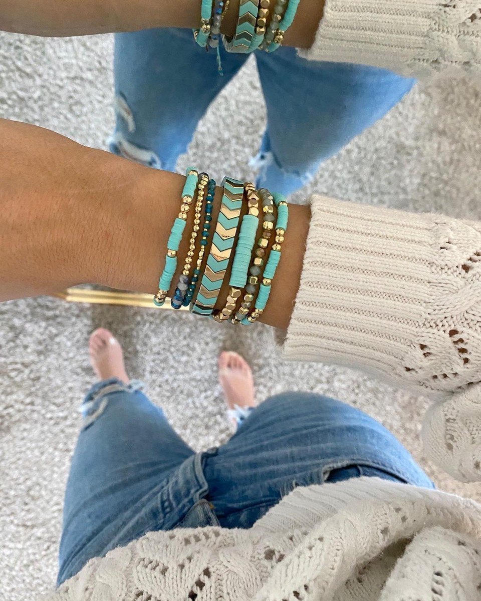 Complete your look with a pop of color 💙 #kinsleyarmelle #stainlesssteeljewelry #bracelets #braceletstack #boho #bohojewelry #bohostyle #popofcolor #summer #summerstyle #clayjewelry