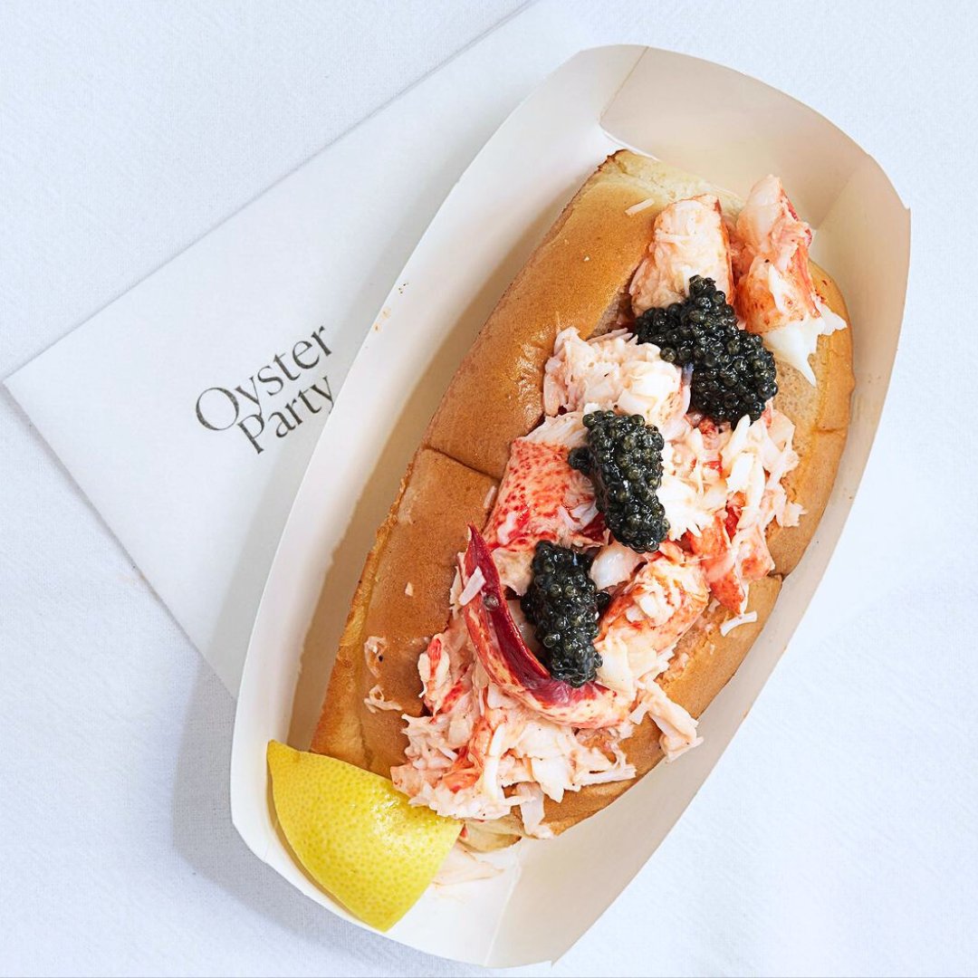 Take your lobster roll to the next level with a touch of caviar! 🦞🥂 This is a must-try for seafood lovers!  #FamousFoodFestival #oysterparty #lobsterroll #caviar #lobsterlover #caviarlover #seafoodexperience #devourpower #buzzfeast #eeeeeeats #eatingnewyork #foodcoma #eatfamous