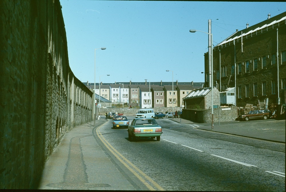 Dens Road, looking up to the junction with Dura Street, although the road layout has changed somewhat in the last 25 years. Date: Oct 1998 Ref: GD/X1384 Dundee Centre & North Tray 3 #Dundee #Archives