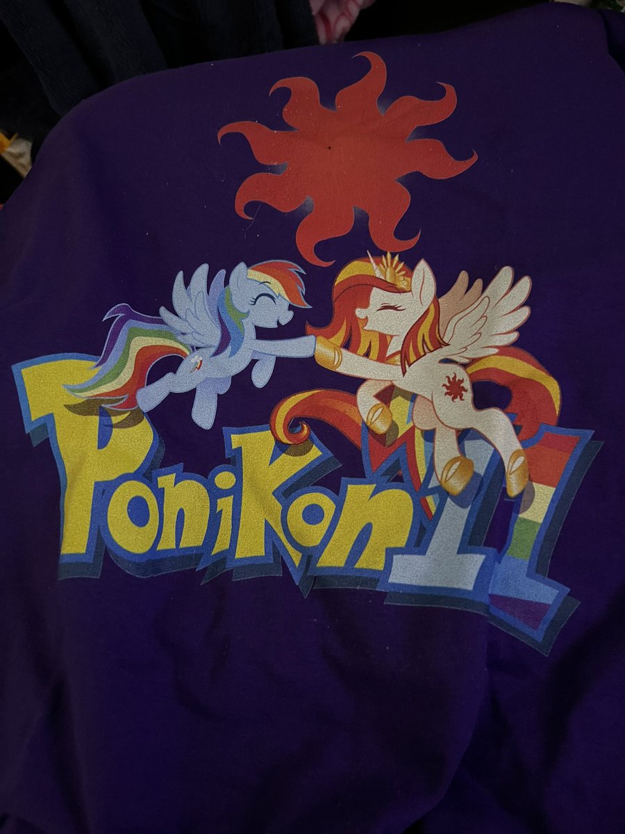 Eeeeeee~ my @Poniko_MLP Japan Ponycon shirt arrived! 🥰💚 (You can buy them online from their official TeePublic)