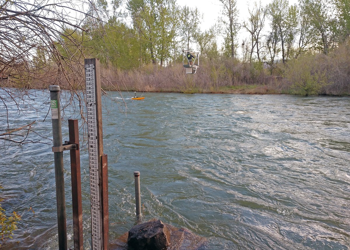 Hydro tech John Carricaburu using an acoustic Doppler current profiler to measure #Boise River streamflow last Thursday. Periodic physical measurements help keep our streamgages reporting accurately: waterdata.usgs.gov/monitoring-loc……. Photo by Erik Smith, @USGS. #USGS #Idaho