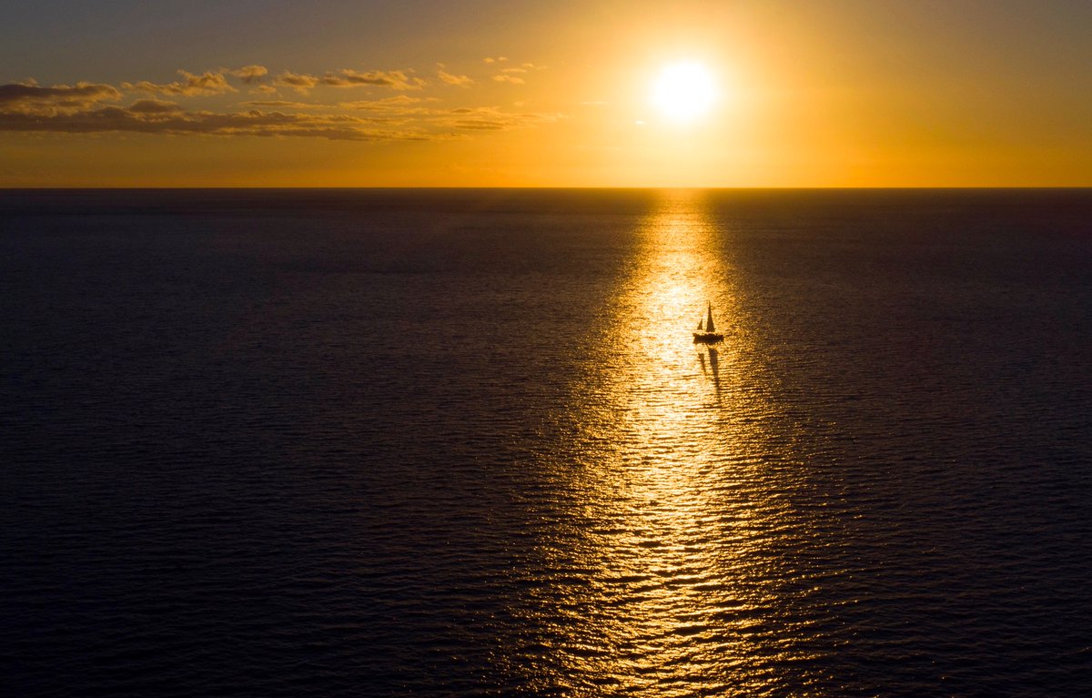 Small boat in a big sea