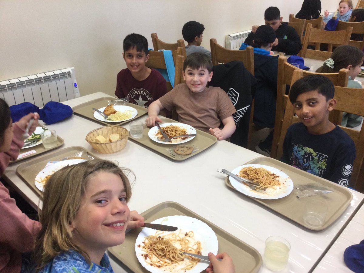 Everyone is enjoying tucking into their evening meal! #derbyhighprimary #bonappetit