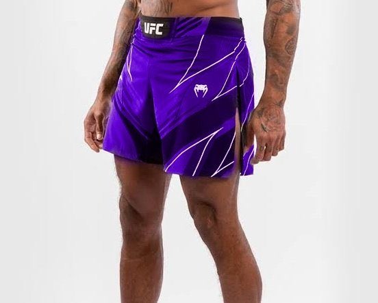 FosdickGage's tweet photo. Should the UFC add purple fight kits? 
#UFC https://t.co/jxBDxzXZtA