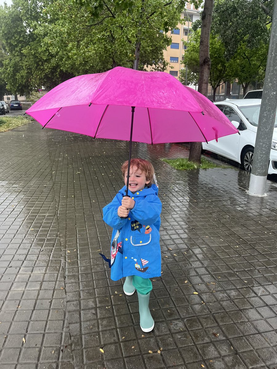 Walk under the rain with no rush whatsoever with my 3 yo son. #life #totallywet