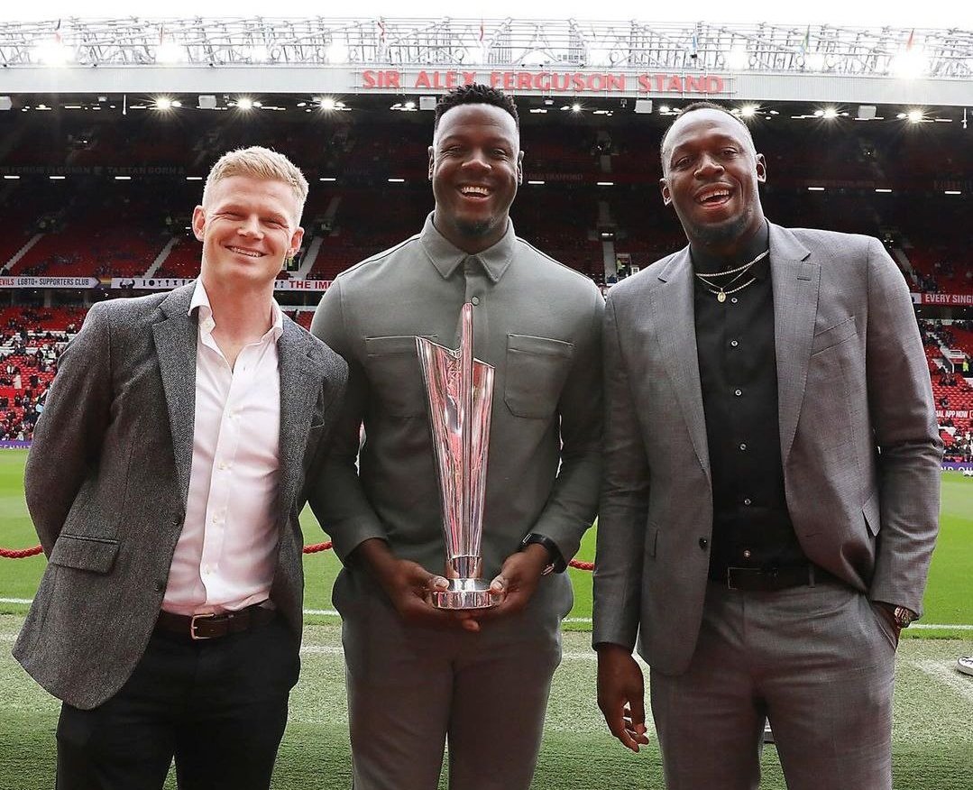 Usain Bolt, Braithwaite and Billings with the 2024 T20 WC Trophy at the Old Trafford. 🏆