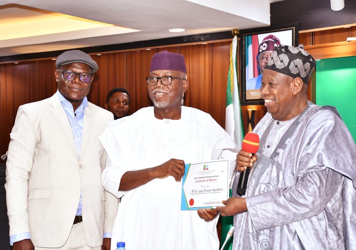 Ondo State Governor, Hon Lucky Aiyedatiwa (M), receiving the Certificate of Return as candidate of APC in the forthcoming gubernatorial election, from National Chairman of the APC), Abdullahi Ganduje, while National Secretary of the Party, Sen. Surajudeen Ajibola Basiru watches.