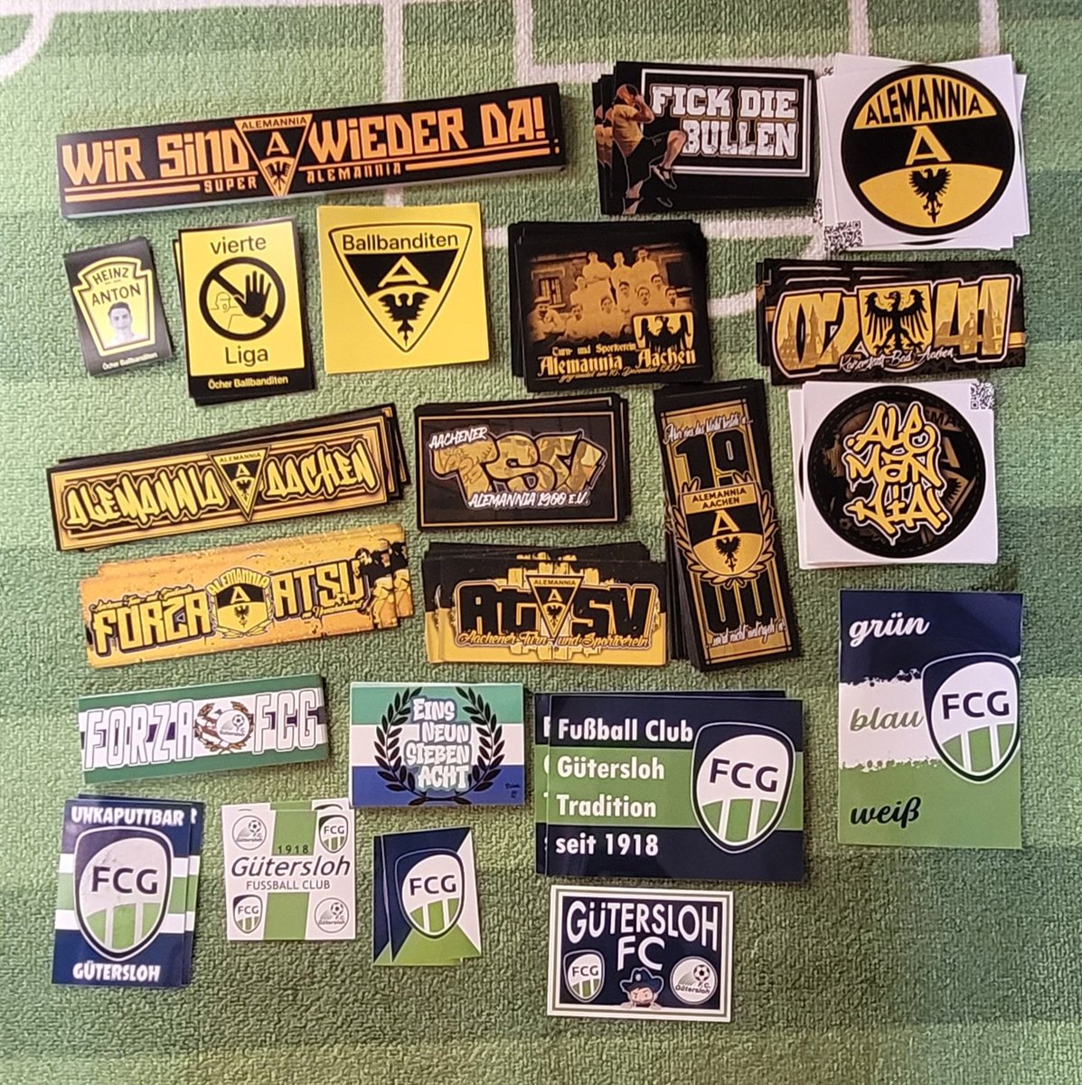 Souvenirs from my trip. So many, I needed 2 photos 😁

As well as my usual haul of scarves, got lots of new shiny Ultras stickers too. 🇩🇪⚽️