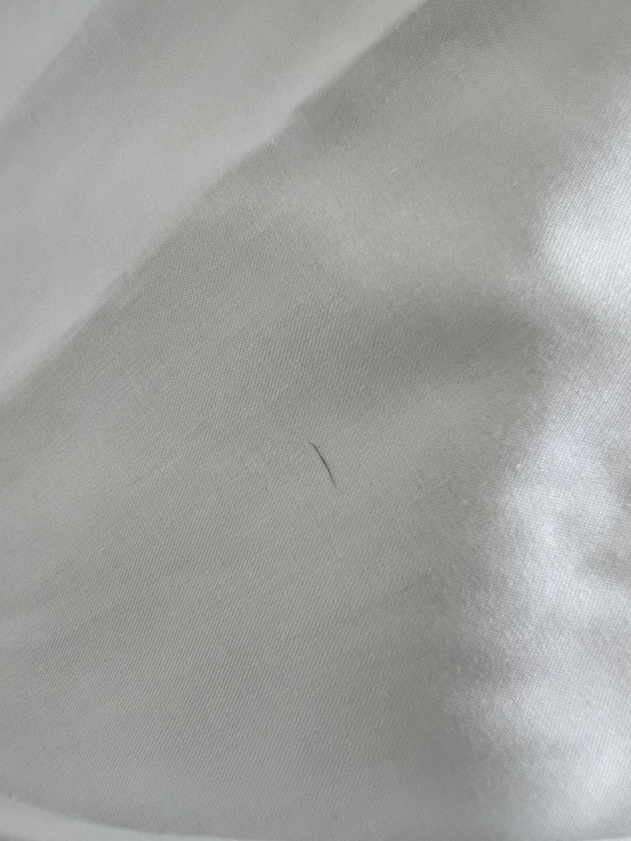 Omi_bitch's tweet photo. @JohnLewisRetail £65 for a shirt and this is how you send it out to your customers. Disgusting! https://t.co/OkgsbzZOVv