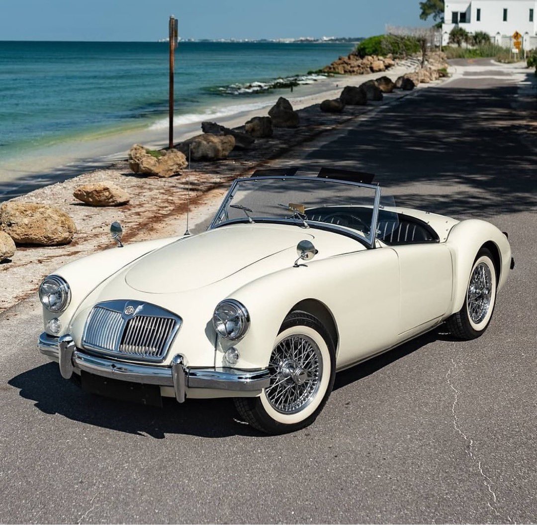 The perfect car, with the perfect backdrop! A '59 MGA roadster by the sea... That'll do nicely, thank you!! 

😍

📷 @car_cave_srq

#mg #mgoc #mgocspares #mga #classiccars #oldcars