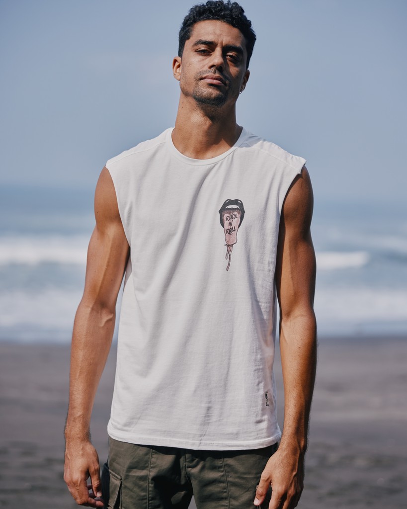 The Tongue Tank. Effortless with an edge⁠
rlgn.shop/ugREf
.⁠
#graphics #ootd #mensstyle #graphictee #beachstyle