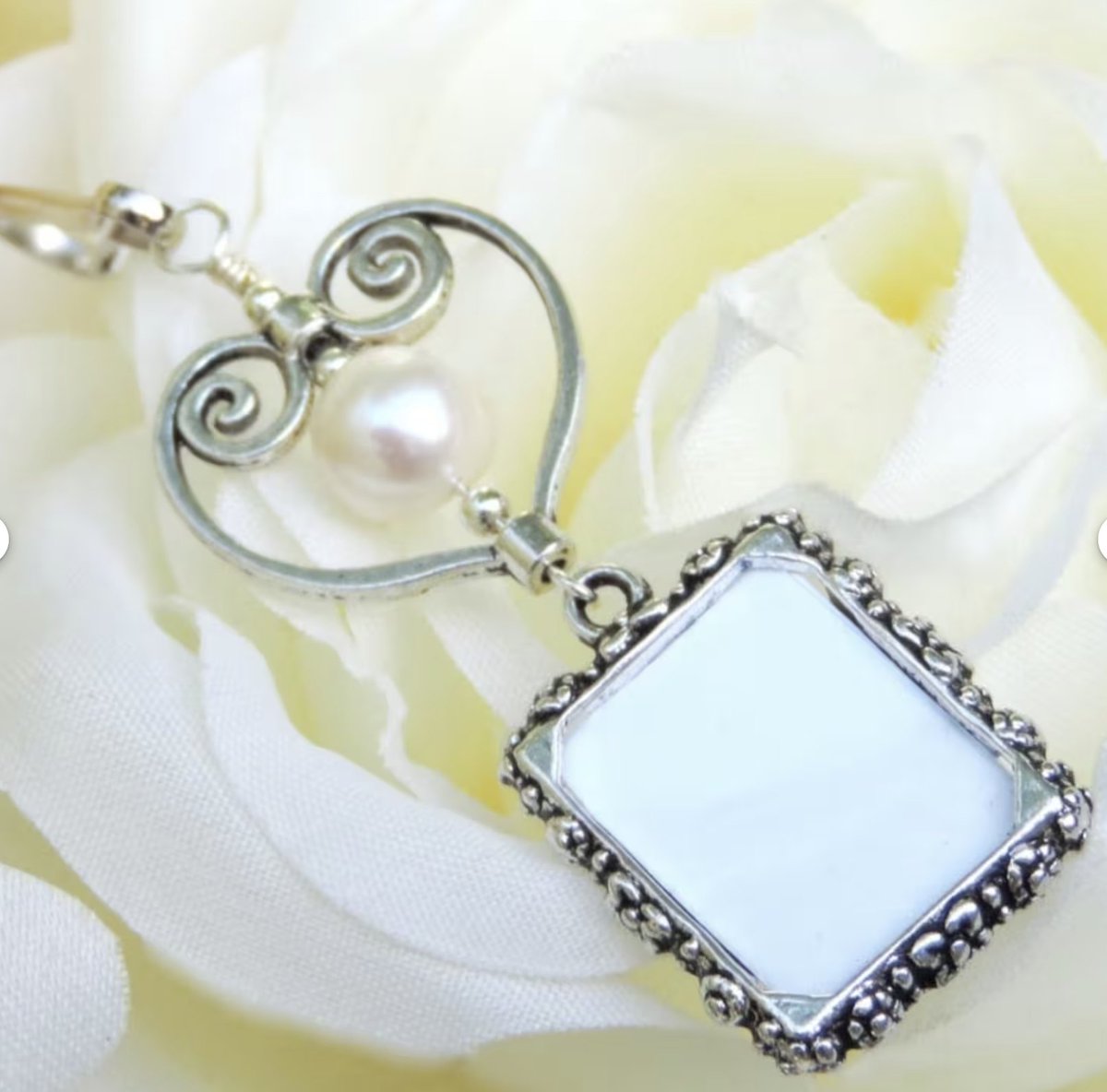 Wedding bouquet photo charm with small picture frame, heart and pearl. Memorial keepsake. smilingbluedog.etsy.com/listing/253706… via @Etsy #etsyseller #memory #family #memento #shopping #onlineshopping #womaninbiz #etsypreneur #etsyfinds #shopsmall #heart #lovely #giftideas