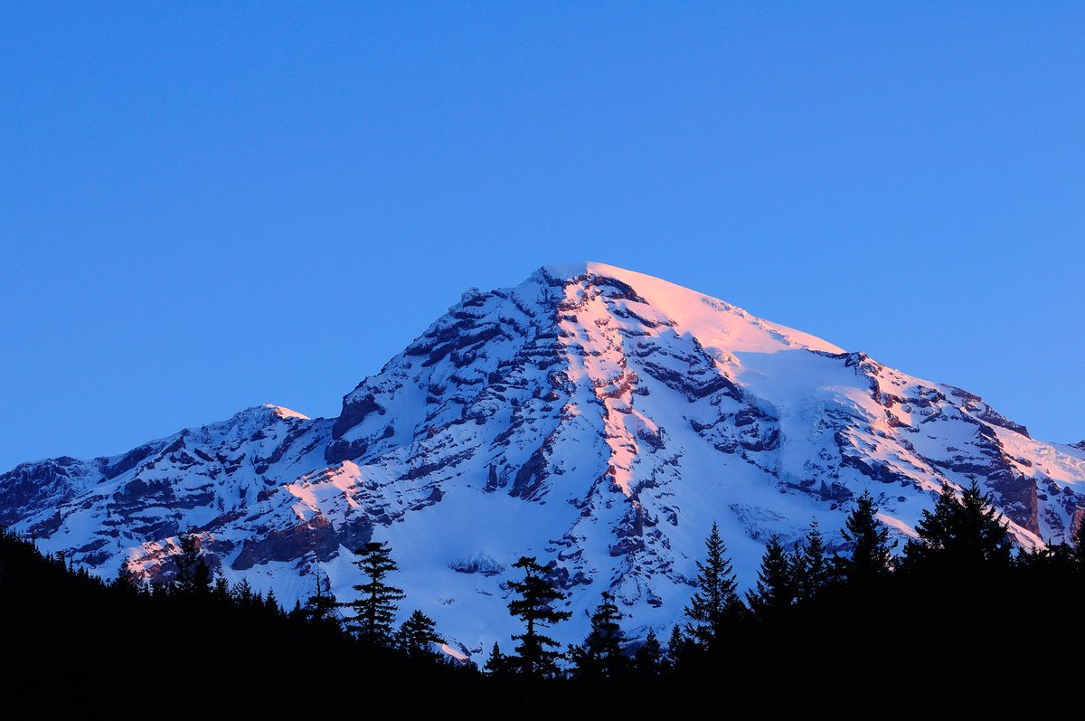 Sunrise light on Mount Rainier summit from Longmire Meadow; #MountRainierNationalPark, Washington. #MountainMonday