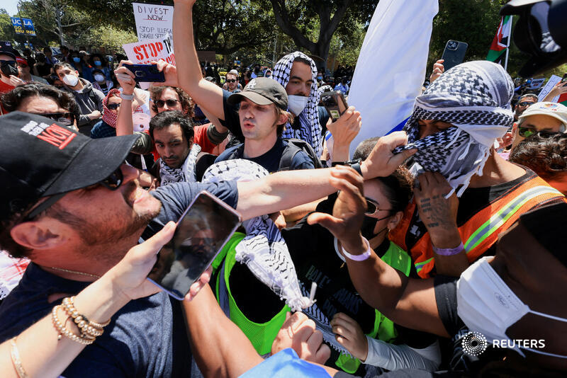 Reuters's tweet photo. Protests at US universities showed no sign of slowing over the weekend, with more arrests on campuses across the country and skirmishes between pro-Israeli and pro-Palestinian demonstrators at UCLA, where a tent encampment was set up last week https://t.co/IZqJzu2uZt https://t.co/m0d5msBGFD