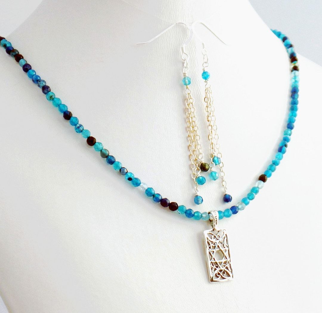 Indigo and Aqua Apatite Necklace with Star of David design, paired with elegant Dangle Drop Earrings. Perfect set for a touch of spirituality and style. #JewelrySet #StarOfDavid #bmecountdown buff.ly/3Ui2zP6