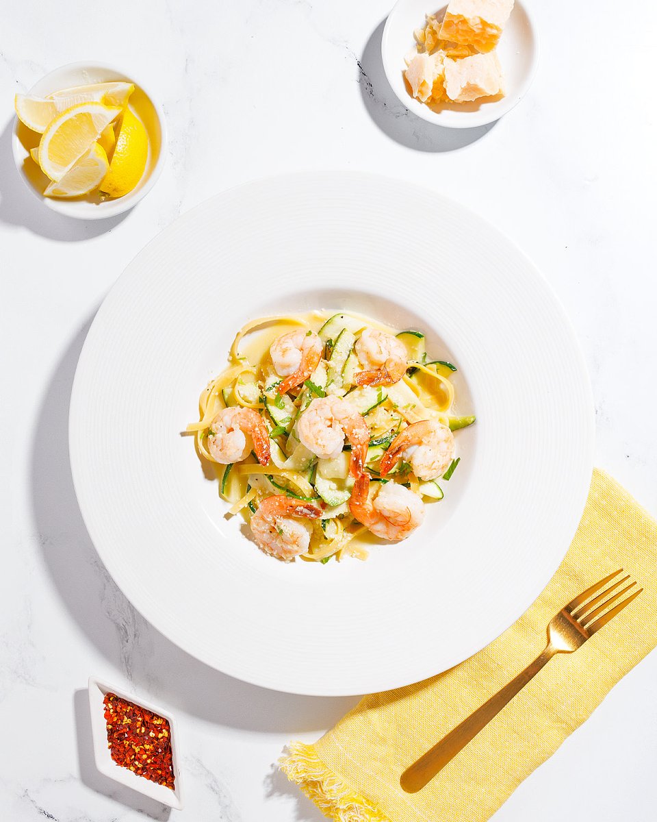 #NationalShrimpScampiDay? Who knew! Our Shrimp Scampi Zucchini is a lighter spin on a traditional recipe. Zucchini ribbons sautéed with lemon, garlic, and white wine, tossed with fresh Italian parsley, Parmesan, and a touch of fettuccine. #CPK #CaliforniaPizzaKitchen