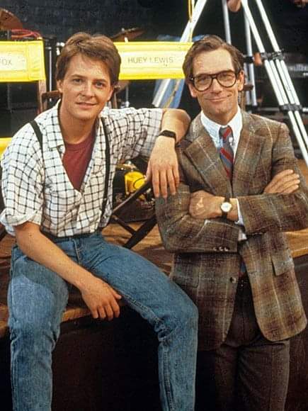 Michael J. Fox and Huey Lewis on the set of Back to the Future 1985.