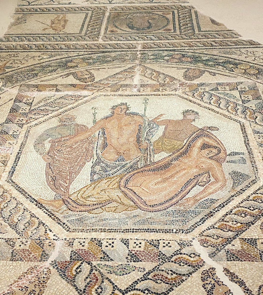 Mosaics of the “House of Dionysus” Chania (Kydonia). 3rd century CE In the centre of the room, in an octagonal emblem, is the legend of Dionysus discovering Ariadne on Naxos, together with two members of his retinue. #mosaicmonday