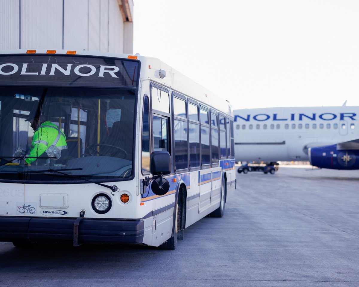 Nolibus in front of the Noliplane 🤓

#nolinor #nolinoraviation #aviation #goldstandard #beyondexpectations #buildingalegendontime #biggestfleet #30yearsexperience #realairline #b737200 
#boeing #boeinglovers #boeing737 #b737 #aviationlovers #aviationdaily #dailyaviation