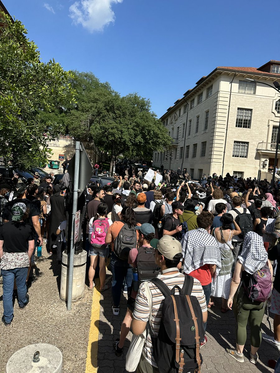 This is the view toward the tower, students have forced police back and blocked the road, chanting “fuck you fascists” now. People are mad after the mace