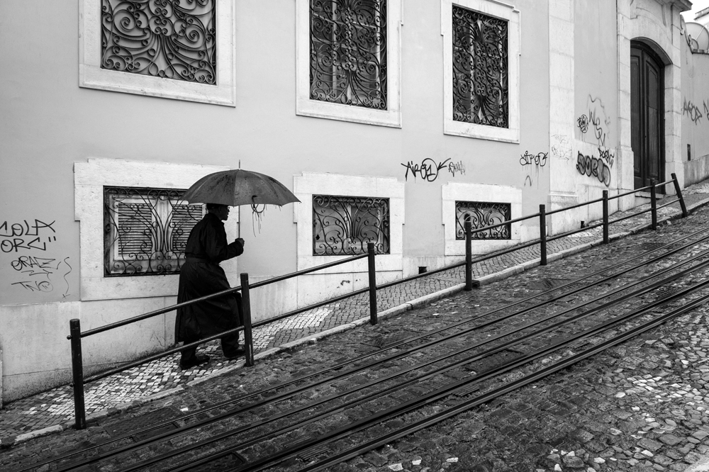 Lisbon, Portugal #streetphotography #Lisbon #blackandwhitephotography #rain