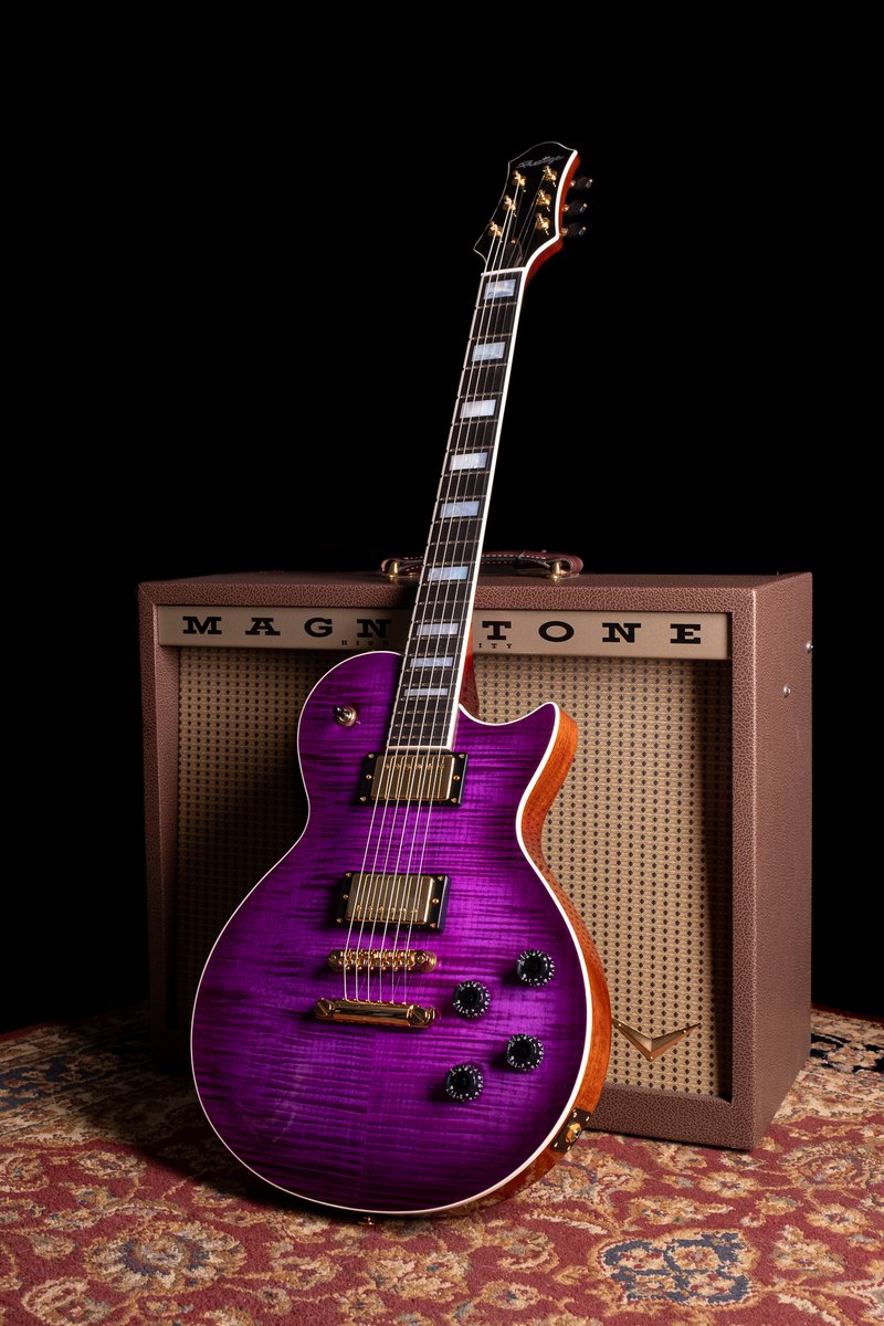 Check out this Purple Burst! The perfect compliment to this killer Flame Maple top with Gold hardware.