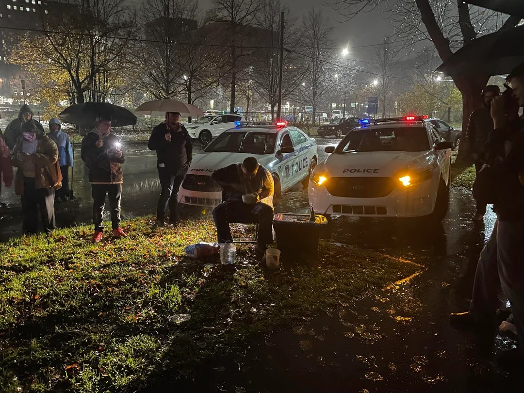 I see your “NYC cheese ball man” and I raise you “that time Halifax residents met in a cemetery in a downpour in the dark to watch a man eat a 5lb bucket of potato salad by the light of a cop car”