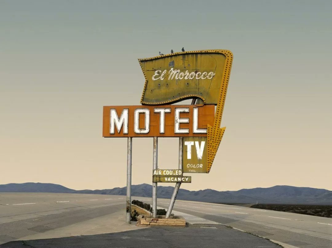 Painting by Bob Dylan. 'No Vacancies'. 2019. Acrylic on canvas. I have found this... It seems that the painting was inspired by this sign, and this photograph by Ed Freeman. El Morocco Motel, Bakersfield, California.