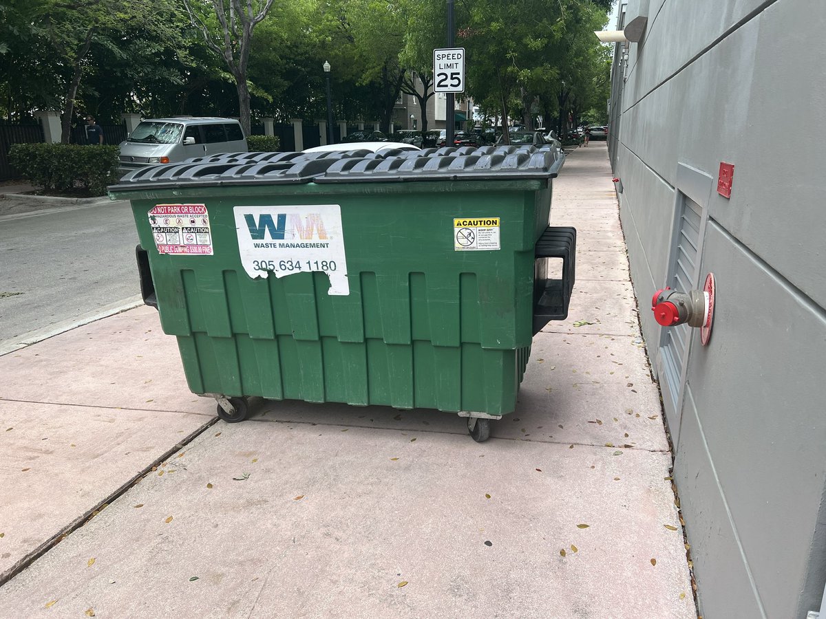 Meridian Ave from 5th St south to 2nd St is one of Miami Beach’s most serene, tree-lined oases. Then you get to a huge, ugly blank wall between 1st-2nd. Making matters worse, a giant trash receptacle persistently blocks the sidewalk. Fix this! #wheelchairaccess #miamibeach #ADA