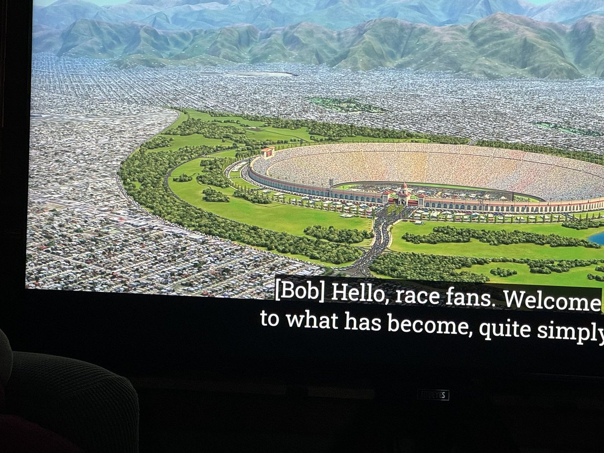 Watching Cars and wondering why is there a parking lot outside the racetrack? Did these cars drive there just to not go to the race?