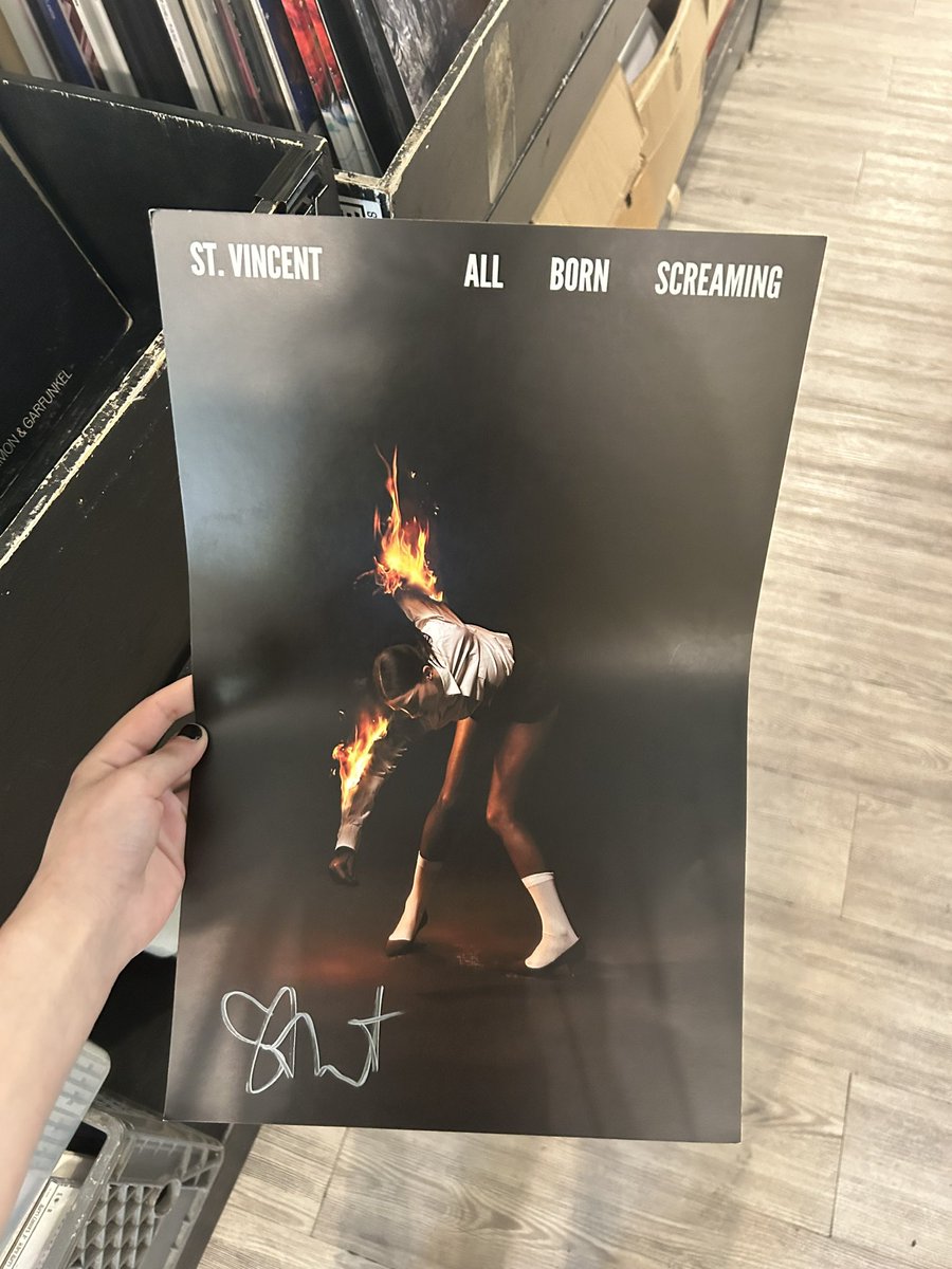 walked into a record store in raleigh, nc and asked the owner if he had any copies of all born screaming. he said he sold out the ver the weekend and after chatting about st vincent for a couple minutes he told me he did have one thing and he gave me a signed poster for free?? 🥲