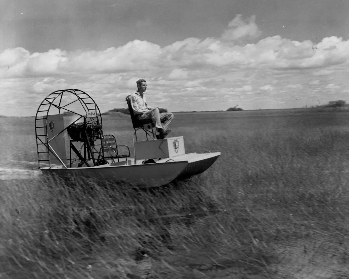 Sending it into the week like... 🚤 💨 Here we have a park ranger using an airboat to patrol sawgrass prairies of the Everglades circa 1960. #floridasportsman #floridalife #florida #floridaboating #everglades #sawgrass #glades