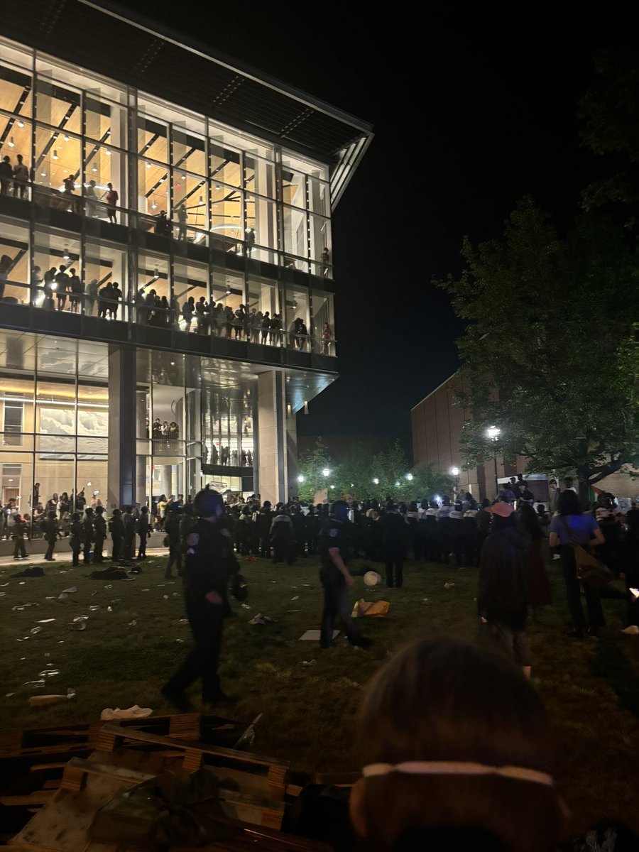 “This is what your fucking tuition is going to.” Students yell as they pass cops barricading students in.