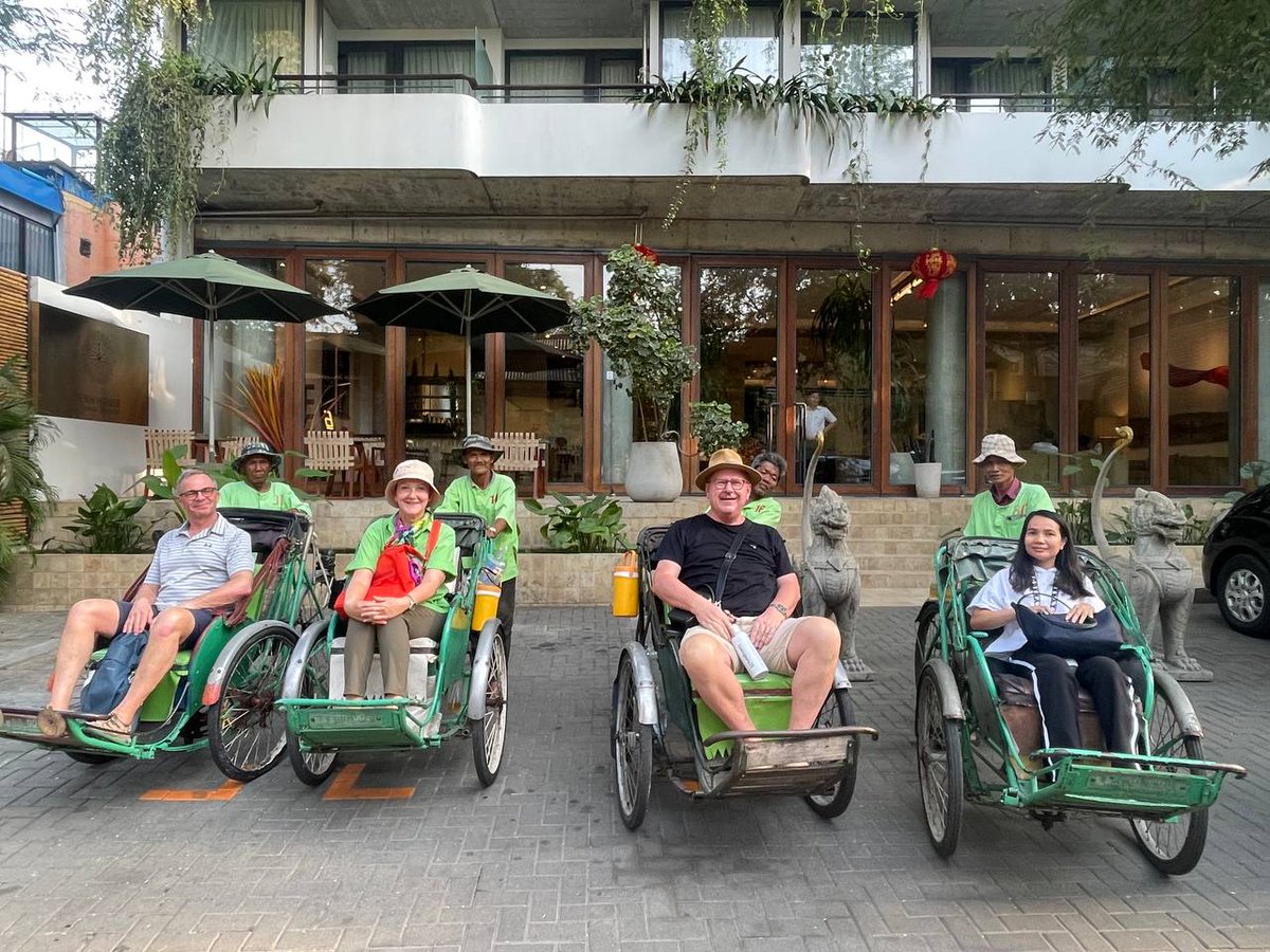 Our Belgian and Thai guests waiting for a cyclo tour of Phnom Penh.