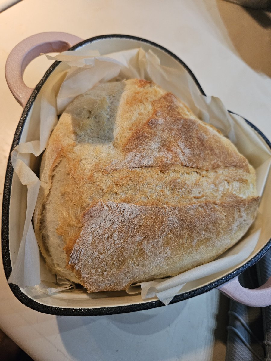 Oh my god look she's a baker!! My first attempt at artisan bread. Literally went out for a dutch oven and swooped this heart dutch oven someone was hiding!! God I love bread and it came out so good uugh