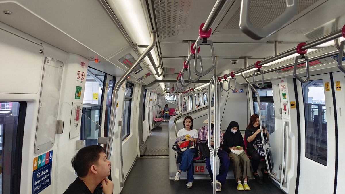 Changed 3 lines BTS in Bangkok
Dark Green>Light Green>Pink

All on a single ticket.

Platforms next to each other hardly need to walk or move out of the station.

While we can't travel from Ghatkopar to Dahisar on a single ticket yet!