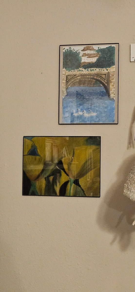 Two pieces of my dear departed friend's, Anya's, art her mom graciously gave to me. I immediately knew where I wanted them in our living room, and they're in direct view when you enter our home. I love that she has a prominent place in our home. #RestInPower