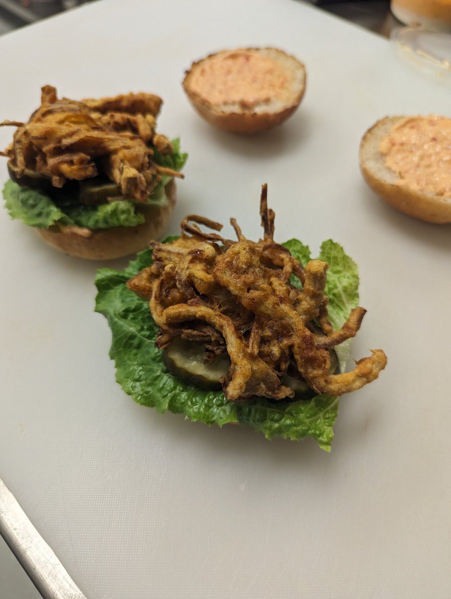 How it started vs how it ended. Blue oyster mushroom pakora on a whole wheat roll with lettuce, pickles, and sambal mayo. #veganfood