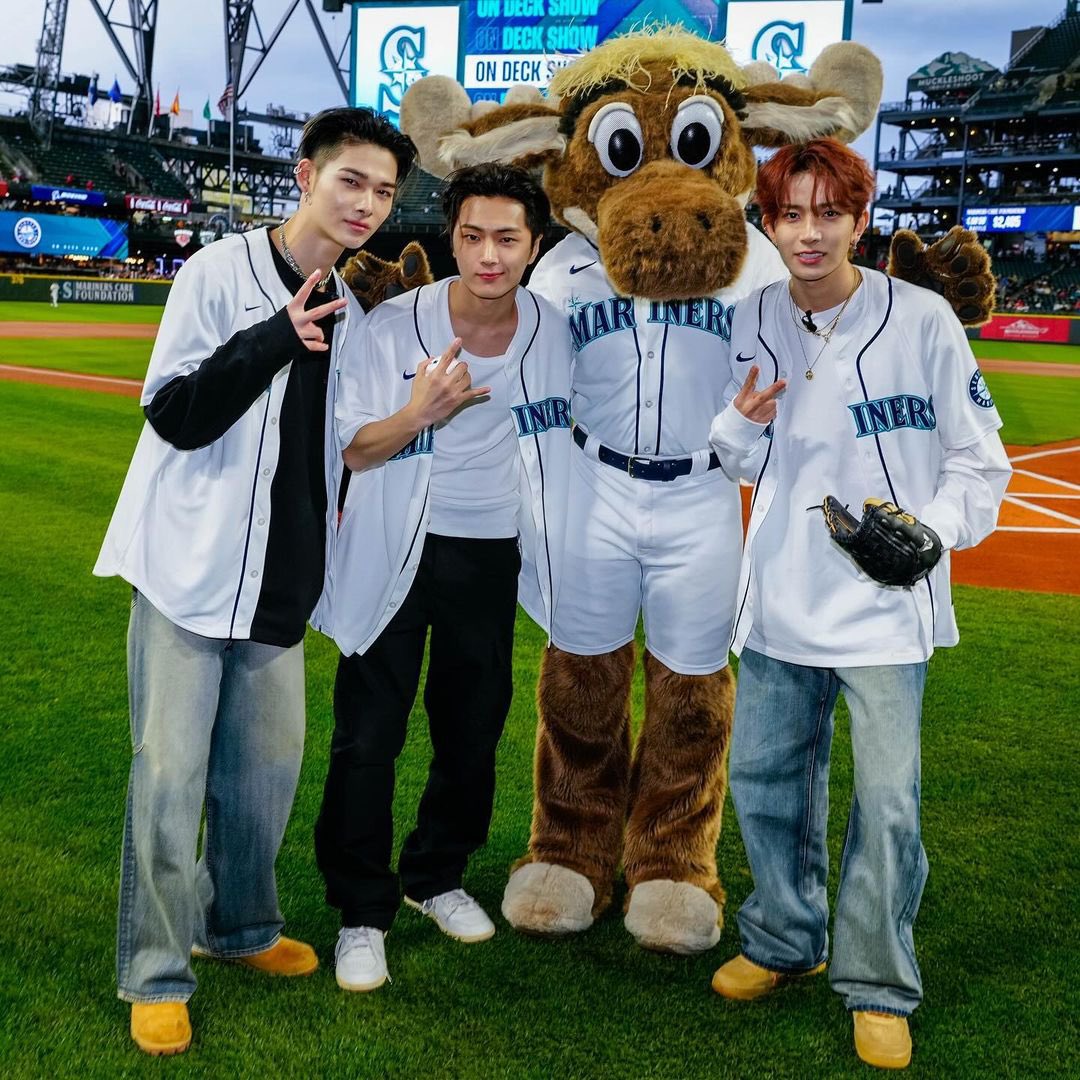 Ni-ki, Jay, and Heeseung of ENHYPEN at an MLB game today.