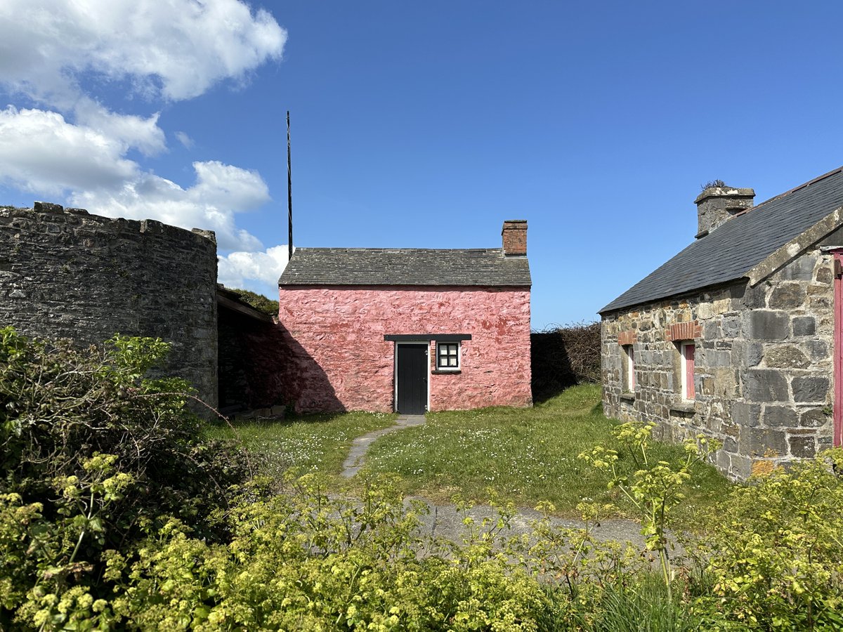 Parallel lines and a daub of red. Can't put my finger upon why this little building in the small coastal town of Newport, Pembrokeshire lifts the spirits - quite sublime. Vernacular at its best.