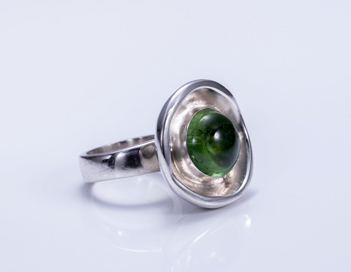 Silver flared lip ring with Green Chrysoprase. For handmade, textured and hallmarked silver jewellery visit  margaretgriffithsilverjewellery.com #sterlingsilver #Margriff #earlybiz #FCworkspace #etsy