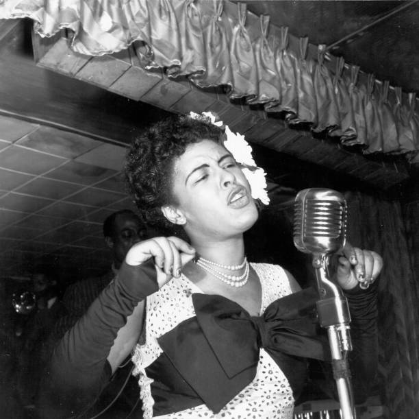 Billie Holiday performing in New York. 📷 Michael Ochs Archives