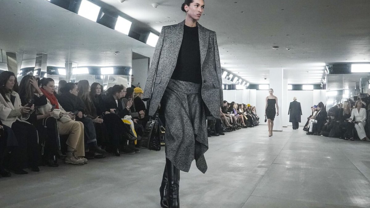 Michael Kors emphasizes his role in boosting confidence through design at his #NYFW show.  Check out the stunning looks from his Fall/Winter collection! #FashionWeek2024 #MichaelKors